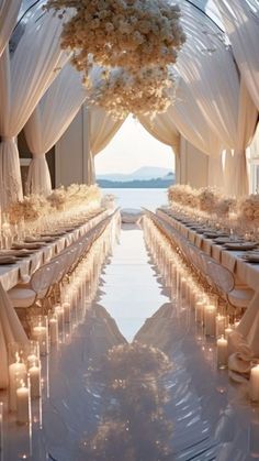 an outdoor wedding venue with white drapes and candles