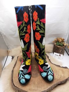 Western Embroidered Boots For Festivals, Western Style Embroidered Boots For Festival, Western Style Embroidered Festival Boots, Embroidered Winter Festival Boots, Winter Festival Embroidered Boots, Embroidered Snip Toe Boots For Festival, Embroidered Leather Knee-high Boots, Traditional Fitted Boots With Round Toe, Traditional Black Boots For Fall