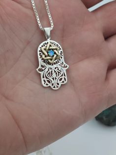 Sterling silver Hamsa pendant combined with 14K yellow gold Star of David and opal The dimensions of the pendant are H - 1.10 inch / W - 0.79 inch. David Star, Hamsa Pendant, Hamsa Necklace, Star Of David, Gold Star, Gold Stars, 10 Inch, Pendant Necklaces, Jewelry Necklace Pendant