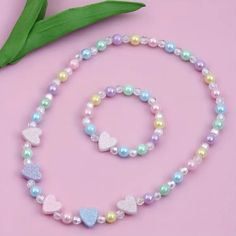 Beautiful Pastel Glitter Hearts With Pastel Beading Stretch Necklace And Bracelet Set. See My Other Listings For More Jewelry. Bundle And Save On Shipping. #K5 Pastel Bracelets, Amber Necklace Baby, Kandi Necklace, Pastel Bracelet, Multicolor Bracelet, Pastel Christmas, Heart Shaped Pendant Necklace, Necklace And Bracelet Set, Kids Accessories Jewelry