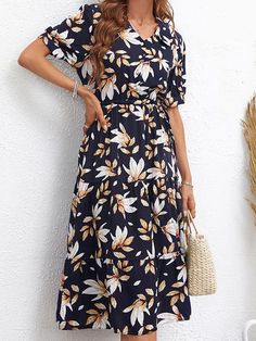 Navy Casual Spring Dress, Casual Navy Midi Dress For Spring, Navy Short Sleeve Casual Midi Dress, Navy Casual Short Sleeve Midi Dress, Navy Floral Print Summer Dress, Navy Casual Floral Print Dress, Navy Short Sleeve Maxi Dress For Spring, Navy Maxi Dress With Short Sleeves For Spring, Navy Casual Maxi Dress For Spring