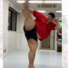 a man in red shirt and black shorts standing on one leg