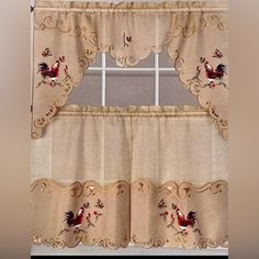 the window curtain is decorated with roosters on it's side and has an attached valance