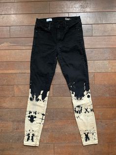 Black Gap stretch skinny jeans size 27R with bleach tie dyed detail How To Dye Jeans Black, Casual Fitted Bleached Bottoms, Fitted Bleached Jeans For Spring, Bleach Painting Black Jeans, Casual Fitted Bleached Jeans, Spring Fitted Bleached Jeans, Fitted Straight Leg Bleached Jeans, Dye Jeans Black, Bleach Dyed Jeans