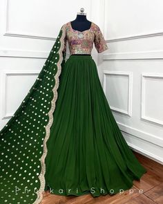 Made to Order/Measurement/Custom Order Lehenga - Color : green - Fabric : Georgette - Fully flared paneled lehenga - Embroidered  Blouse -  Net Dupatta with Gold Border - Drawstring closure with Tassels - - It can be customize in any design or size  PLEASE NOTE: BUYERS ARE RESPONSIBLE FOR ANY CUSTOMS AND IMPORT TAXES THAT MAY APPLY. This is a made to order product. If you opt for 'Made To Measurement Option', we will provide a measurement template and you can share the measurements likewise. If you want to opt for 'Standard Size', Please refer to the size chart provided in the listing. Shipping: Standard Shipping is done by DHL ecommerce and it mostly takes 2 to 3 weeks to deliver after dispatch. Express Shipping is done by DHL express and it mostly delivers within a week after dispatch. F Green Lehenga Choli, Wedding Lehenga Choli, Sequence Embroidery, Party Wear Lehenga Choli, Green Lehenga, Lehenga Blouse, Indian Lehenga, Party Wear Lehenga, Wedding Lehenga