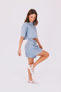 Go all in or go home with our All Or Nothing Set! This set includes an ultra-chic crop denim button-down shirt and a pair of oversized fit shorts. Perfect for adding a touch of playfulness to your wardrobe while staying comfortable and stylish. Don't miss out on this unique set! Details Crop denim button-down shirt Oversize fit shorts Sizing Approximate measurements: SIZE LENGTH/INSEAM BUST/WAIST Small Top 16" 46" Small Bottom 17/5.5" 30" Medium Top 16.5" 48" Medium Bottom 18/6" 32" Large Top 17 Trendy Relaxed Fit Cropped Shirt For Summer, Summer Cotton Cropped Shirt For Day Out, Cotton Cropped Shirt For Summer Day Out, Trendy Cropped Shorts For Day Out, Medium Wash Short Tops For Spring, Relaxed Fit Cropped Shirt With Pockets For Summer, Trendy Cropped Shirt With Pockets For Summer, Trendy Summer Cropped Shirt With Pockets, Relaxed Fit Jean Shorts For Spring Day Out