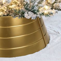 Add the final touch to your Modern Farmhouse Christmas with this Gold Metal Tree Collar. Made for 6ft high trees, any shapes or colors, the versatile design works with a variety of holiday decor. This unique tree collar keeps everything neatly contained, producing a streamlined look underneath your tree. Glitzhome 22-in Gold Tree Collar Tree Skirt | 2010600040 Gold Tree Collar, Metal Tree Collar, Modern Farmhouse Christmas, Tree Collar, Modern Farmhouse Design, Gold Tree, Unique Trees, Metal Tree, Tree Stand