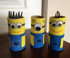 three toilet paper tube crafts made to look like minion characters