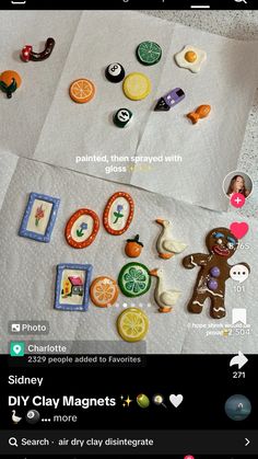 some buttons and magnets sitting on top of a white sheet with the words diy clay magnets