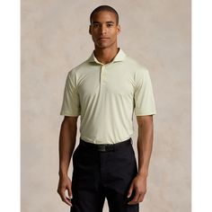 This striped Polo shirt is crafted with lightweight stretch jersey that is developed to wick away moisture. Fitted Golf Tops With Striped Collar, Casual Golf Tops With Contrast Stripes, Classic Striped Tops For Golf, Striped Cotton Tops For Golf, Casual Striped Golf Tops, Casual Striped Tops For Golf, Ralph Lauren Fitted Striped Shirt, Ralph Lauren Fitted Striped Top, Fitted Striped Ralph Lauren Top