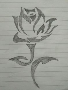 a drawing of a flower on lined paper