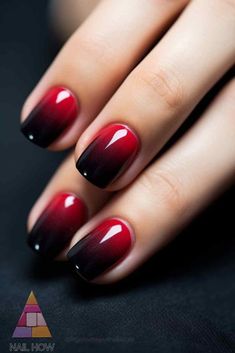 Red and Black Ombre Nails: Make a bold statement with these red and black ombre nails. The striking gradient is perfect for a dramatic and edgy look. Check out more fierce nail designs at nailhow.com. Black And Red Dip Powder Nails, Ombre Nail Short, Red And Black Nails Acrylic Oval, Simple Short Black Nail Ideas, Disney Nails Red And Black, Hombre Red Black Nails, Red And Black Ombre Gel Nails, Red Black Ombre, Black And Red Ombre Nails Almond