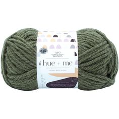 a ball of yarn with the words blue and me on it in green, white and brown