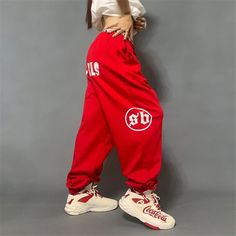 Made from top-quality polyester and cotton materials, these loose sweatpants for women complement your carefree personality perfectly. Featuring a straight fit that is further enhanced by their flat front design, these hip-hop bottoms come with an elastic waist that ensures you stay comfortable for hours. Adorned with pockets that not only look great but are super convenient too, this trendy streetwear is a must-add to your collection!Specifications Waist Type: MID Style: Casual Season: Spring/A Hip Hop Style Relaxed Fit Sweatpants, Baggy High Waist Cotton Joggers, Baggy High Waist Hip Hop Sweatpants, High Waist Baggy Hip Hop Sweatpants, Trendy High Waist Cotton Joggers, Trendy High-waist Cotton Joggers, Hip Hop Style Loungewear Bottoms With Letter Print, Hip Hop Style Letter Print Bottoms For Loungewear, Trendy Baggy Sweatpants For Sports