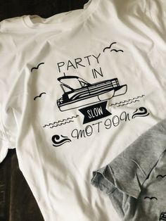 Party in slow motion pontoon boat graphic crew neck tees, adult unisex clothing, personalized captain and first mate t-shirts, great gift White Custom Print T-shirt For Bachelorette Party, Graphic Tee T-shirt With Letter Print For Bachelorette Party, Graphic Tee For Bachelorette Party With Letter Print, Graphic Tee With Letter Print For Bachelorette Party, Bachelorette Party Graphic Tee With Letter Print, White Custom Print T-shirt For Party, White Graphic Print T-shirt For Bachelorette Party, White T-shirt With Text Print For Party, Bar Mitzvah Party