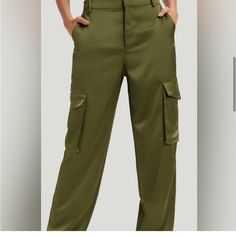 * Zip Front W/ Tab Closure, High Rise, Flat Front * Front Slant Pockets; Cargo Pockets, Back Slash Pockets * Loose, Easy Fit; Wide Straight Leg * Unlined * Color: “Juniper Green” * Fabrication: Polyester * Size: 8 * Measurements: Waist: (32”), Hips: (40”), Rise: (13”), Inseam: (31”), Cuff: (8”) * New With Tags High Waist Green Cargo Pants For Workwear, Chic Mid-rise Pants With Cargo Pockets, Chic Green Cargo Pants With Pockets, Chic Mid-rise Cargo Bottoms, Chic Mid-rise Cargo Style Bottoms, Chic Mid-rise Cargo Style Pants, Chic Mid-rise Cargo Pants, Green Mid-rise Pants For Work, Green Mid-rise Bottoms For Work