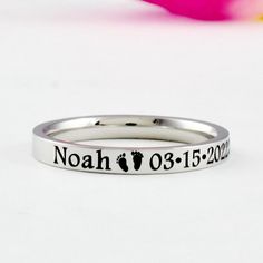 This listing is for one stainless steel band ring, engraved with Baby Name, Birth Date Time, Weight, Height..., the baby feet symbol is by default between the name and date. It makes a special gift for the newborn baby's mom and family. Materials & Features: This ring is made of high quality hand polished solid stainless steel, which is hypoallergenic (good for metal-sensitive skin). Stainless steel will not tarnish, its luster and durability will make it last for many years. The black text on t Baby Stats, Baby Rings, Heart Symbol, Wide Ring, New Mom Gift, Fade Out, Wide Rings, Vermeil Jewelry, Cute Rings