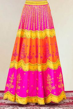 Fuchsia pink-yellow-orange lehenga highlighted with mirror-thread embroidery, drawstring with tassels at the waist and scallop edged hem. Comes with criss-cross back blouse and dupatta.
Components:3
Embroidered
Neckline:Leaf
Sleeve Length:Sleeveless
Fabric:Dupion Silk
Color:Pink, Yellow
Embroidered blouse
Embroidered dupatta with scallop edged hem
Blouse: Hooks at the back
Lehenga: Drawstring with tassels at the waist
Note: The fabric is silk blend and not pure silk - Aza Fashions Leaf Sleeve, Orange Lehenga, Embroidery Leaf, Embroidered Dupatta, Dupion Silk, Hem Blouse, Embroidered Neckline, Thread Embroidery, Silk Embroidery