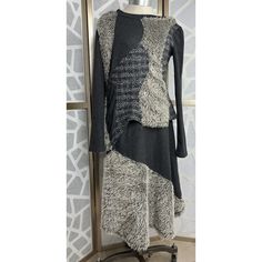 This Aimee G Two-Piece Outfit Is A Must-Have For Any Fashion-Conscious Woman. The Asymmetrical Textured Patchwork Design Adds A Touch Of Edginess To The Elegantly Styled Set. The Long-Sleeved Sweater And Skirt Are Made Of A Stretchy Cotton Blend That Will Keep You Comfortable All Day Long. The Gray Color Of The Set Is Accentuated By The Multi-Type Of Fabric Used In The Accents, Making It Perfect For Any Occasion. The Outfit Is Perfect For Women Who Want To Make A Statement While Remaining Comfor Fall Patchwork Asymmetrical Skirt, Fitted Asymmetrical Skirt For Layering, Winter Fitted Skirt With Asymmetrical Hem, Sweater Midi Skirt, Skirt Set Outfit, Sweater And Skirt, Serger Sewing, Midi Skirt Set, Sweater Skirt Set