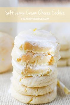 soft lemon cream cheese cookies stacked on top of each other