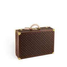 LOUIS VUITTON® - Alzer 65 - Vuittonite Travel Trunk, Round Leather, Louis Vuitton Official, All Around The World, Female Travel, Louis Vuitton Handbags, Monogram Canvas, Travel Luggage, Leather Handle