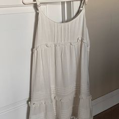 Nwot Lulu Medium Babydoll Mini Dress Daytime Spaghetti Strap Dress With Ruffles, Cute White Sundress With Ruffle Hem, Flowy Lined Mini Dress For Daywear, White Flowy Sundress With Ruffle Hem, Off White Ruffled Casual Mini Dress, Casual Off White Mini Dress With Ruffles, Casual Off-white Ruffled Mini Dress, Casual Off-white Ruffled Dress, Cute White Flowy Sundress