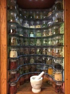 a spice rack filled with lots of different kinds of spices