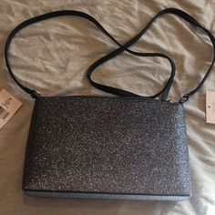 Nwt Gorgeous Kate Spade Cross Body Bag. Glitter Bag, Leather Strap. Joeley Style. Color Is Dusk Navy. Strap Is Navy And The Glitter Is A Blueish Silver. Amazing Evening Bag Or Fun To Add To A More Casual Going Out Accessory. A Definite Statement Piece Glitter Bag, Kate Spade Bag Crossbody, Cross Body, Blue And Silver, Evening Bags, Statement Pieces, Leather Straps, Kate Spade, Going Out