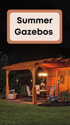 a wooden gazebo sitting in the middle of a lush green field at night with a large white sign above it