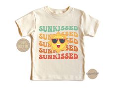 🌞👕 Embrace the summer vibes with our Sunkissed Kids Shirt collection! Perfect for your little sun lovers, our Toddler Shirt is designed for endless fun under the sun. Crafted with soft, breathable fabric, our Sun Lover Shirt ensures your child stays comfortable all day long, whether they're building sandcastles at the beach or playing in the backyard. Featuring vibrant designs, our Beach Kids Shirt is a must-have for those sunny days by the shore. It's the perfect Newborn Gift Shirt for welcom Playful Yellow Tops For Vacation, Playful Soft-washed Tops For Summer, Playful Soft-washed Summer Tops, Cute Summer Tops For Summer Adventures, Cute Tops For Summer Adventures, Unisex Soft-washed T-shirt For Summer, Playful T-shirt For Beach In Spring, Playful Beach T-shirt For Spring, Playful Cotton T-shirt For Vacation