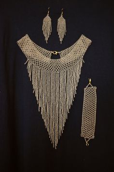 the necklace and earrings are made out of chains