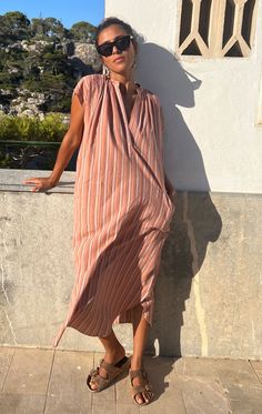 Our slim dress is back in our new mauve stripe colorway Opaque and easy to wear all summer long. small production. Color: Mauve and rose stripe — Handwoven cotton, length 50", width 25.5" — Side Pockets — One size fits 2-10 — Free shipping for purchases Striped Relaxed Fit Dress For Vacation, Chic Relaxed Fit Striped Dresses, Striped Summer Daywear Dress, Striped Summer Maxi Dress For Daywear, Summer Striped Midi Dress For Daywear, Striped Midi Dress For Summer Daywear, Striped Summer Dresses For Daywear, Striped Summer Dress For Daywear, Mauve Dress