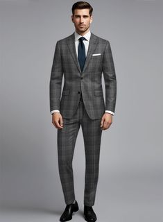 Enhance your wardrobe with our distinguished Noble Dark Gray Check Wool Silk Linen Suit. Meticulously crafted from a refined blend of wool, silk, and linen, exudes sophistication with its captivating dark gray hue and eye-catching plaid pattern. It envelops you in supreme comfort, providing a gentle touch against the skin and an impressive drape that harmonizes effortlessly. Whether you find yourself at a relaxed dinner or a crucial professional meeting, opt for this suit to guarantee not only a Timeless Plaid Suits For Work, Timeless Plaid Suit For Work, Elegant Plaid Business Suit, Timeless Plaid Suit With Notch Lapel, Luxury Plaid Suit For Office, Timeless Plaid Suits With Notch Lapel, Plaid Wool Suits For Business, Business Plaid Wool Suit, Plaid Wool Business Suit