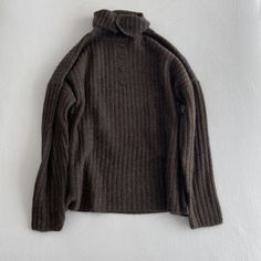 This is perfect for those who are looking for a clothing for a good price. It is fashionable, stylish, and it will look great on anyone who wears it. Do you wanahavit? Classic Winter Tops With Buttons, Wool Button-up Top For Winter, Solid Button Sweater For Work, Winter Knit Tops With Buttons, Winter Workwear Tops With Buttons, Cozy Knit Tops With Buttons, Cozy Workwear Tops With Button Closure, Buttoned Tops For Winter Workwear, Buttoned Tops For Workwear In Winter