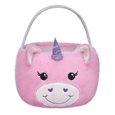 a pink purse with a unicorn face on it