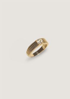 The 0.5cw version of the Solis is our most popular ring style. Inspired by Jennie's mother's vintage pleated ring, the Solis collection represents energy and strength. This ring features a round brilliant diamond prong set in a 14k solid gold ribbed band. 14k solid gold—always Non-hollow Average weight: 5.37g Band width: 5mm (front), 3.5mm (back) Diamond 4 C's: 0.50cw, Round Brilliant, VS2, G/H, Excellent Cut Custom sizing is available. Custom sized pieces are final sale. This piece cannot be re Gold Band Engagement Rings, Ribbed Ring, Rib Ring, Engagement Rings Romantic, Fall Rings, Solitaire Diamond Ring, Popular Rings, Solid Gold Band, Vs2 Diamond