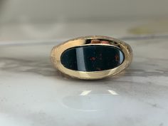 10kt yellow gold ring set with a genuine 11x7mm bloodstone! Weighs 6.4dwt and is currently a size 9 but can be resized! Bloodstone Ring, Gold Ring Sets, Yellow Gold Ring, Yellow Gold Rings, Rings Statement, Ring Set, Ring Sets, Gold Ring, Statement Rings