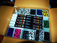 a box filled with lots of different types of buttons