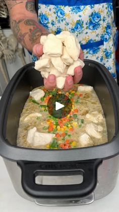 3.1M views · 116K reactions | Easy Crockpot Chicken and Dumplings | Easy Crockpot Chicken and Dumplings | By Drew Cooks | Alright, start by tossing one
diced onion into your crock pot and then dropping four boneless
seamless chicken breast right on top of it. In a separate
mixing bowl, add together one can of cream of celery, one can
of cream of chicken, about a tablespoon of fresh chopped
parsley, a teaspoon of poultry seasoning, grab your tiny
whisk, whisk it all together. Once it's combined, just pour
it on top of the chicken. Spread it out evenly. Cover all
of that up. Then add some black pepper to taste. Two cups of
chicken broth. Just pour it right on top of there. And you
can throw the lid on. Cook it for three to four hours on high
depending on your Crockpot. Once there's one hour Crockpot Chicken And Dumplings Easy, Crockpot Chicken N Dumplings, Drew Cooks, Easy Crockpot Chicken And Dumplings, Crock Pot Suppers, Chicken Spread, Dumplings Easy, Crockpot Foods, Crockpot Chicken And Dumplings