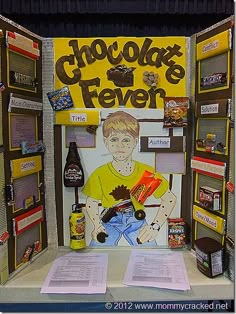 a display in the shape of a booth for chocolate fever