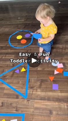 a toddler playing with an easy and fun activity for toddlers to learn shapes