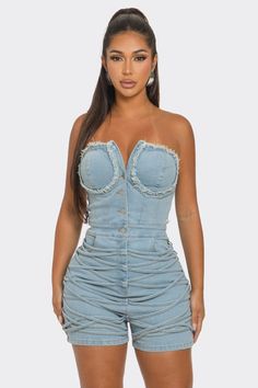 This unique garment blends classic denim charm and a modern corset layout, offering a sweetheart neckline and structured bodice. The frayed edges add edgy charm, while the button-front detail adds to its retro feel. Made from high-quality denim with a hint of stretch, this romper guarantees both comfort and a flattering fit. Wear it with strappy heels and daring accessories for a laid-back outing or a chic evening occasion. Exude confidence and leave a lasting impression with this versatile and stylish romper. Sleeveless Denim Corset Dress, Fitted Strapless Denim Jumpsuit In Blue, Fitted Strapless Denim Blue Jumpsuit, Summer Denim Corset With Corset Back, Strapless Fitted Denim Blue Corset, Denim Blue Fitted Strapless Corset, Fitted High Waist Denim Blue Corset, Spring Denim Corset For Night Out, Fitted Denim Top With Frayed Hem