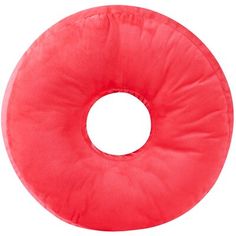 a red round pillow on a white background