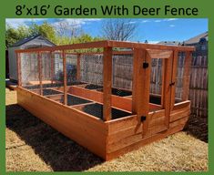 a large wooden garden bed with chicken cages in it and the words 8x16's garden with deer fence