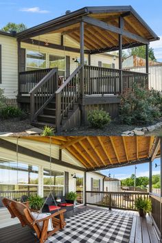 before and after photos of a deck with an awning over the porch, covered in wood