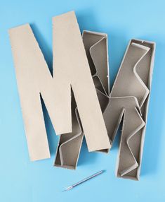 the letter m is made out of cardboard and ready to be cut into smaller pieces