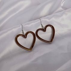 Don't miss out on these beautiful brown resin heart earrings. They work with a large variety of looks and add a bit of sparkle to your outfit. MORE jewellery pieces available on our shop! Any questions please message we are happy to help. Free postage in UK Thank you for shopping with us Heather&Bumble 📪Follow us at: Instagram: heatherandbumble Twitter: Heather_Bumble Pintrest: Heather & Bumble Brown Resin Heart Earrings - Resin Earrings,Brown Heart Earrings,Resin Heart Earrings In The UK,Brown Earrings In The UK,Brown Jewellery Brown Earrings Aesthetic, Brown Outfits, Brown Heart, Quinceanera Planning, Brown Earrings, Earrings Aesthetic, Brown Jewelry, Earrings Resin, Bride Jewelry