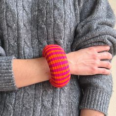 Free US Shipping! -------------------------- Hand woven Bracelet, made of strong and sustainable Werregue palm fibers. This bracelet is woven by indigenous women from the Choco region (located in the west Colombia/ pacific coast). It's fibers have been dyed with fruit and vegetable juices resulting in an organic, sustainable, eco friendly product. Every bracelet is uniquely designed. ------------------------------------ This specific Bracelet can't be shipped to PO Boxes as it is sent through Fe Bohemian Pink Cuff Bracelet As Gift, Handmade Orange Cuff Bangle, Trendy Handmade Cuff Bracelet For Festivals, Handmade Trendy Cuff Bracelet For Festivals, Handmade Orange Bangle Cuff Bracelet, Handmade Orange Cuff Bracelet Bangle, Handmade Adjustable Pink Bangle, Adjustable Handmade Pink Bangle, Handmade Pink Bohemian Bangle