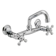 a chrome faucet with two handles and nozzles on the side,