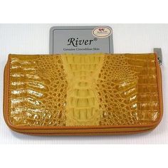 AUTHENTIC RIVER GENUINE CROCODILE HORNBACK SKIN LEATHER LONG WALLET ~BRAND NEW   AN ELEGANT, RETAIN A NEW LOOK DURING LONG LIFE, DURABLE LEATHER.  THE SIZE MEASURES (CLOSED) :    7 1/2" x 4 1/4" INCHES    THIS LONG WALLET COME WITH CHECKBOOK & PASSPORT SLOTS.    THERE ARE 2 SLOTS FOR CHECKBOOK, 1 SLOT FOR PASSPORT, 8 CARD SLOTS, 1 ZIP SLOT AND 2 BILL SLOTS.         AN ELEGANT, RETAIN A NEW LOOK DURING LONG LIFE, DURABLE LEATHER.   STYLISH & LUXURY WITH YELLOW TWOTONE COLOURS.    HANDMADE    PROD Luxury Women's Wallets With Card Slots, Cheap Women's Wallets With Crocodile Pattern, Luxury Yellow Wallets For Women, Cheap Yellow Wallet With Zipper, Luxury Yellow Rectangular Wallet, Womens Wallets, Leather Long Wallet, Iphone 4s Case, Crocodile Leather